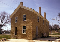 Cleveland's Hall and Blacksmith Shop, a Building.