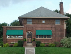 Sniteman, Charles C. and Katharyn, House, a Building.