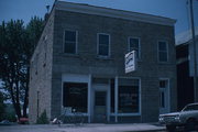 SW SIDE OF MAIN ST, 150' W OF BEAN ST, a Commercial Vernacular grocery, built in Benton, Wisconsin in 1867.