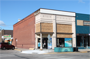 255 S KNOWLES AVE, a Commercial Vernacular small retail building, built in New Richmond, Wisconsin in 1912.