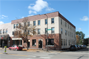 105-109 S KNOWLES AVE, a Commercial Vernacular hotel/motel, built in New Richmond, Wisconsin in 1913.