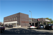 138-144 S KNOWLES AVE, a Commercial Vernacular bank/financial institution, built in New Richmond, Wisconsin in 1964.