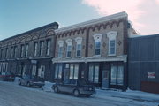 121 W ANN ST, a Italianate small retail building, built in Darlington, Wisconsin in 1883.