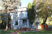 330 S DAKOTA AVE, a American Foursquare house, built in New Richmond, Wisconsin in 1925.