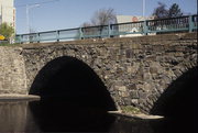 1ST ST, a NA (unknown or not a building) stone arch bridge, built in Merrill, Wisconsin in 1904.