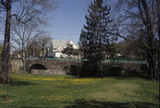 1ST ST, a NA (unknown or not a building) stone arch bridge, built in Merrill, Wisconsin in 1904.