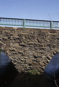 1ST ST, a NA (unknown or not a building) stone arch bridge, built in Merrill, Wisconsin in 1904.