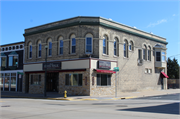 99 S MAIN ST, a Queen Anne large retail building, built in Fort Atkinson, Wisconsin in 1895.
