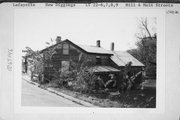 N SIDE, E OF HILL AND MAIN ST INTERSECTION, a Side Gabled house, built in New Diggings, Wisconsin in 1843.