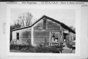 N SIDE, E OF HILL AND MAIN ST INTERSECTION, a Side Gabled house, built in New Diggings, Wisconsin in 1843.