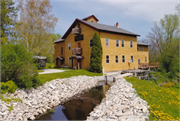 241 S Garden St, a Astylistic Utilitarian Building mill, built in Glenbeulah, Wisconsin in 1857.