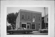 SW SIDE OF MAIN ST, 150' W OF BEAN ST, a Commercial Vernacular grocery, built in Benton, Wisconsin in 1867.