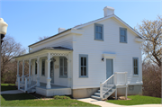 19765 W NATIONAL AVE, a Greek Revival house, built in New Berlin, Wisconsin in 1845.