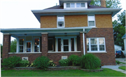 125 S MONROE ST, a American Foursquare house, built in Stoughton, Wisconsin in 1915.