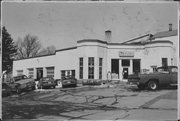 404 MAIN ST, a Art/Streamline Moderne gas station/service station, built in Darlington, Wisconsin in 1930.