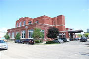 701 E WASHINGTON AVE, a Twentieth Century Commercial automobile showroom, built in Madison, Wisconsin in 1915.