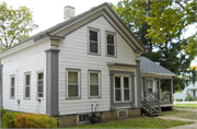 217 S PRAIRIE ST, a Greek Revival house, built in Stoughton, Wisconsin in 1855.