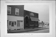 MAIN ST, SW CORNER OF MAIN AND BRIDGE ST (HIGHWAY 11), a Romanesque Revival bank/financial institution, built in Gratiot, Wisconsin in 1900.