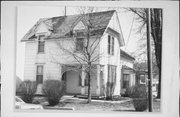 MAIN ST, 50 FEET N OF INTERSECTION WITH COLE ST, E SIDE, a Gabled Ell house, built in Gratiot, Wisconsin in 1880.
