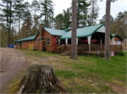 7049N Lake Shore Drive 7049N Lake Shore Drive, a Rustic Style resort/camp building, built in Couderay, Wisconsin in 1974.