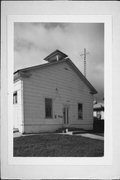 SW CORNER OF CHURCH AND IOWA STS, a Greek Revival church, built in Shullsburg, Wisconsin in 1852.