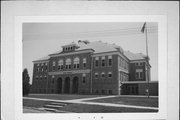 444 N JUDGEMENT ST, a Romanesque Revival elementary, middle, jr.high, or high, built in Shullsburg, Wisconsin in 1900.