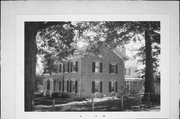 560 S JUDGEMENT ST, a Greek Revival house, built in Shullsburg, Wisconsin in 1852.