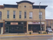 121-123 W MILWAUKEE ST, a Italianate retail building, built in Janesville, Wisconsin in 1869.