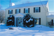 227 W GARFIELD AVE, a Colonial Revival/Georgian Revival house, built in Evansville, Wisconsin in 1940.