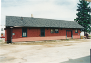 100 E MAIN ST, a Queen Anne depot, built in Waunakee, Wisconsin in 1896.