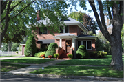 704 W DOVER ST, a American Foursquare house, built in Chippewa Falls, Wisconsin in 1925.