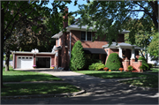 704 W DOVER ST, a American Foursquare house, built in Chippewa Falls, Wisconsin in 1925.