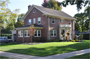 705 W DOVER ST, a Colonial Revival/Georgian Revival house, built in Chippewa Falls, Wisconsin in 1927.