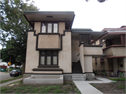 2732-2734 W BURNHAM ST, a Prairie School duplex/two-flat, built in Milwaukee, Wisconsin in 1915.