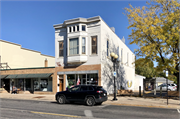 1218-1220 CALEDONIA ST, a Queen Anne small retail building, built in La Crosse, Wisconsin in 1895.