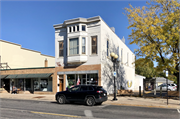 1218-1220 CALEDONIA ST, a Queen Anne retail building, built in La Crosse, Wisconsin in 1895.