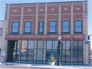 125 S BROADWAY, a Commercial Vernacular retail building, built in De Pere, Wisconsin in 1888.