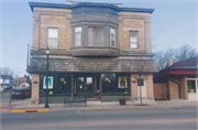 101 N MAIN ST, a Queen Anne large retail building, built in Mayville, Wisconsin in 1897.
