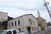 126 E COOK, a Commercial Vernacular large retail building, built in Portage, Wisconsin in 1917.