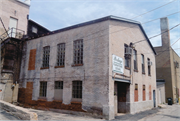 126 E COOK, a Commercial Vernacular large retail building, built in Portage, Wisconsin in 1917.