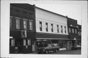 406 W MAIN ST, a Commercial Vernacular large retail building, built in Merrill, Wisconsin in 1919.