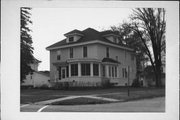 310 N MILL ST, a American Foursquare house, built in Merrill, Wisconsin in 1908.