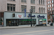307 E WISCONSIN AVE (AKA 301-315 E WISCONSIN AVE), a Italianate large retail building, built in Milwaukee, Wisconsin in 1867.