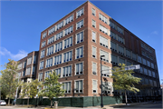 211 N CARROLL ST, a Late Gothic Revival elementary, middle, jr.high, or high, built in Madison, Wisconsin in 1921.