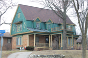 6200 W WISCONSIN AVE, a Dutch Colonial Revival house, built in Wauwatosa, Wisconsin in 1896.