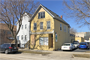 1606 W WALNUT ST, a Front Gabled small retail building, built in Milwaukee, Wisconsin in 1885.