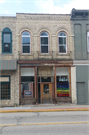 11 E MAIN ST, a Romanesque Revival small retail building, built in Watertown, Wisconsin in 1870.