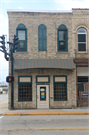 13 E MAIN ST, a Commercial Vernacular small retail building, built in Watertown, Wisconsin in 1867.