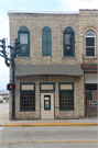 13 E MAIN ST, a Commercial Vernacular retail building, built in Watertown, Wisconsin in 1867.