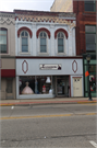 215 E MAIN ST, a Italianate small retail building, built in Watertown, Wisconsin in 1874.